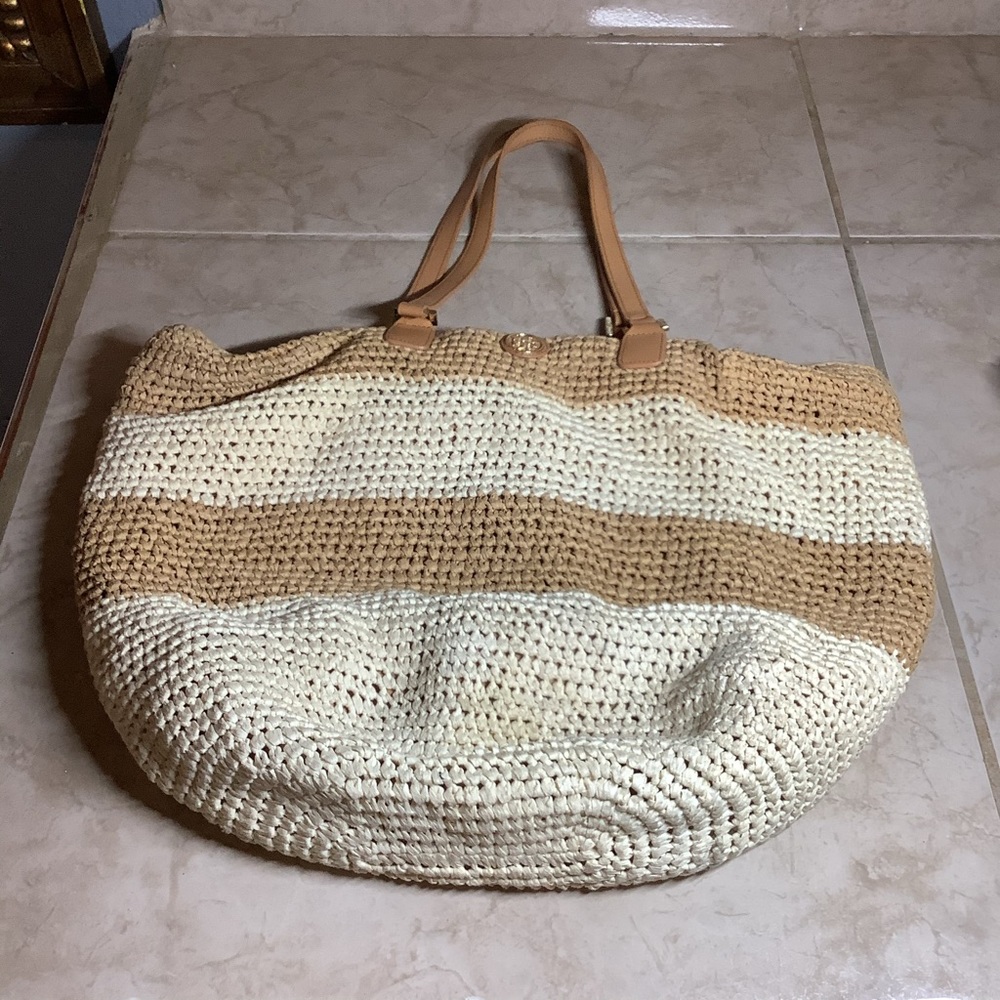 Tory Burch woman cream purse